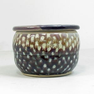 French butter dish in purple and light purple with yellow and light blue polka dots