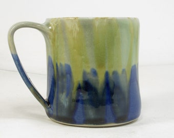 cup in blue and green with light green lines