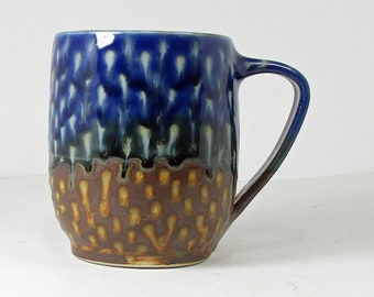 cup in iron red and navy blue with polka dots