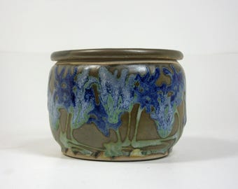 French butter dish in green with blue and light blue flowers
