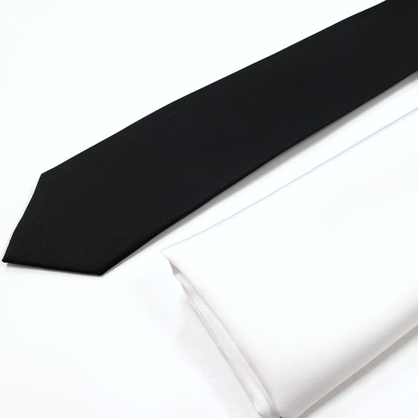 Cravate noire fine (largeur de 7 cm) en sergé fin et pochette de costume blanche en option