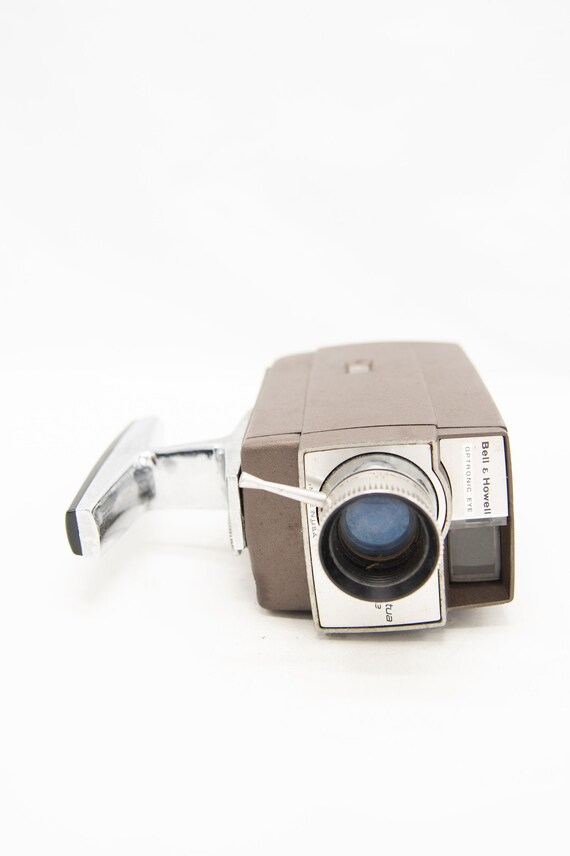 Camera 8mm vintage Bell & Howell Perpetua Electric Eye triple objectif