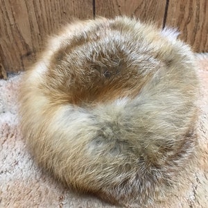 Genuine Red Fox hats. You can ask for medium or large or send us a head measurement. One hat has no tail but is a bit thicker fur.