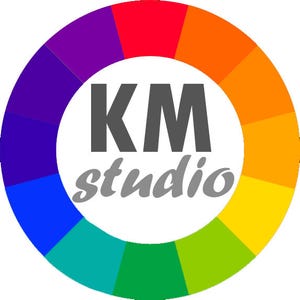 May include: A colorful logo featuring a circular color wheel with segments of red, orange, yellow, green, blue, and purple. The text "KM studio" is centered in the middle of the wheel.