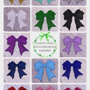 May include: A collection of glittery bow appliques in various colors, including gold, teal, silver, white, green, black, purple, blue, red, and pink. Text in the center reads "Custom colors and combinations available!"