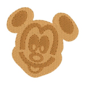 May include: A brown embroidered patch of Mickey Mouse's face. The patch is made of a textured fabric and has a stitched outline.
