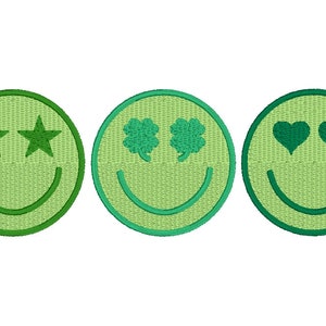 May include: Three green smiley face patches with different eye designs. The first patch has two stars for eyes, the second patch has two shamrocks for eyes, and the third patch has two hearts for eyes.