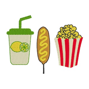 May include: Embroidered image of a refreshing lemonade drink, a corn dog with mustard, and a popcorn container with red and white stripes. The drink has a green lid and straw, and a lemon design. The popcorn is yellow.