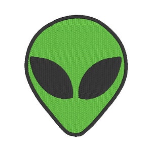 May include: Embroidered patch featuring a green alien head with large black oval eyes and a black outline. The alien head is a classic design, perfect for adding to clothing or accessories.