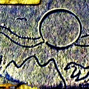 May include: An aerial photograph of a crop circle in the shape of a bird with a large circle in the center. The circle is surrounded by a series of lines that form the shape of the bird's body and wings.