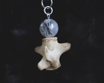 sheep vertebrae bone and rutilated quartz amulet necklace