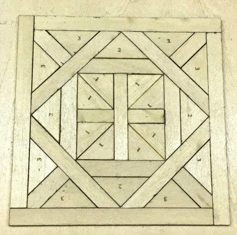 May include: A square, light-colored wooden puzzle with a geometric design. The puzzle is composed of various shapes, including triangles and rectangles, arranged in a symmetrical pattern. Numbers 1, 2, and 3 are visible on some of the pieces.