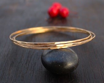 Thin Solid Gold Bangle. One Hammered 14k Solid Gold Bangle. Recycled Gold.