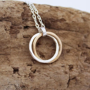 Two Circle Necklace in Silver and Gold.  Interlocking Circles Bond Symbol Necklace in Two Tone Metal.