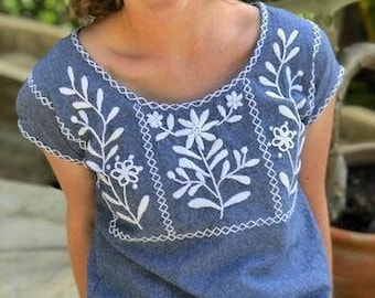 Rococo Blue and white Tee. Chambray cotton with white floral hand embroidery. Made in Mexico. XS-XXL