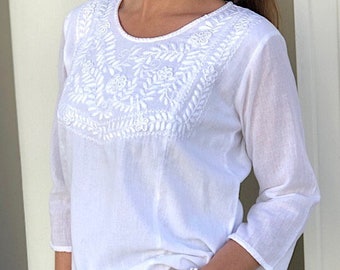 Inesa White Lily Blouse. Double layer Mexican cotton with white hand embroidered floral design. Made in Mexico. S-XXL