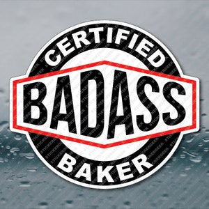 May include: A black and red round sticker with the text "Certified Badass Baker" in a white font. The text "Stickergeek" is repeated around the outer edge of the sticker.