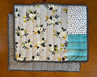 Placemats with silverware holder & washable. Also reversible set of 4