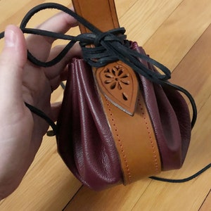 Customizable Round Leather Belt Pouch with Pierced Decorated Strap