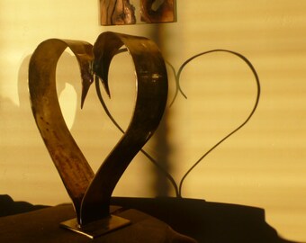 first kiss, abstract steel  heart sculpture