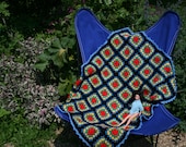French vintage baby blanket, OSTENDE, crocheted granny squares, blue, red, yellow, black and green, blue border