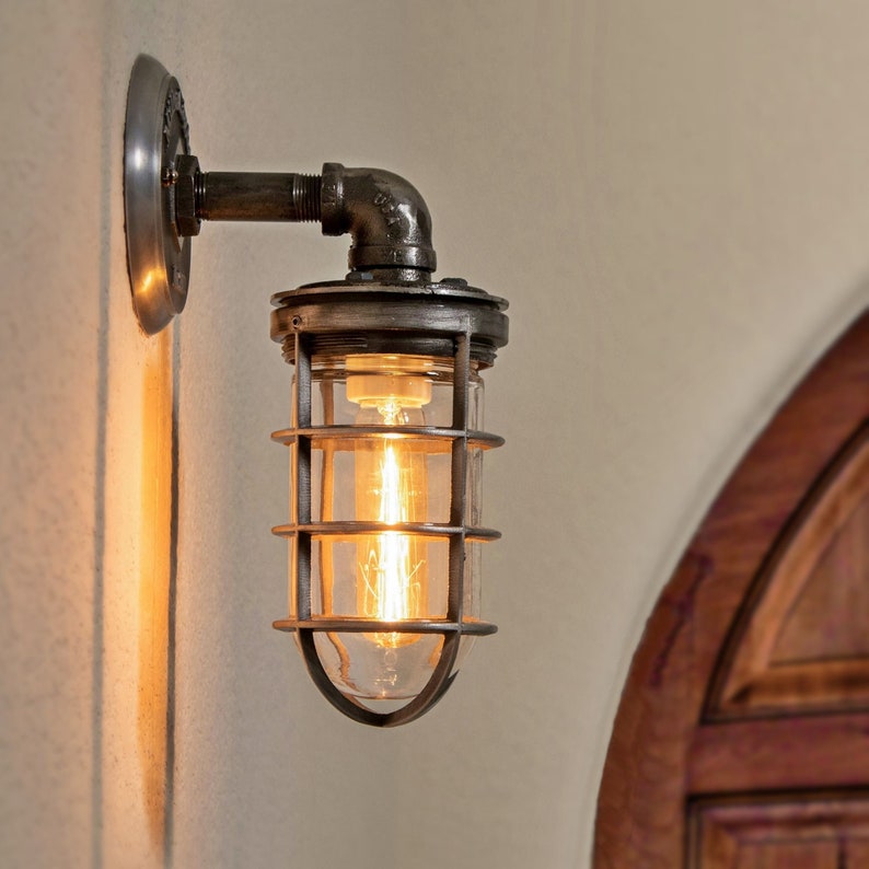 made in usa lighting fixtures wall sconce with industrial cage by millelights