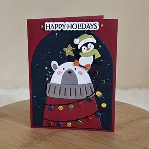 手作りのシロクマとペンギンのホリデーカード、立体的な記念品