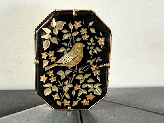 Spanish Damascene Brooch featuring a bird and floral scene