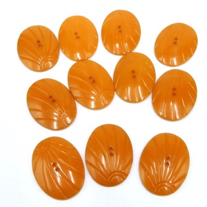 Vintage set of 11 Bakelite oval shape 2 holes button color orange