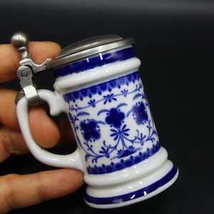 Vintage marked Echt Kobalt small porcelain beer stein lidded pewter artichoke