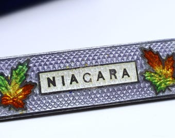 Antique marked sterling silver enamel w Niacara small bar pin