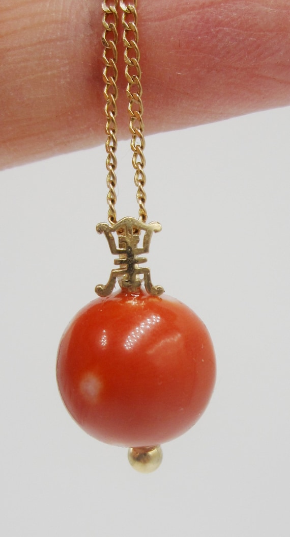 Vintage 14k gold and large MoMo coral bead pendant