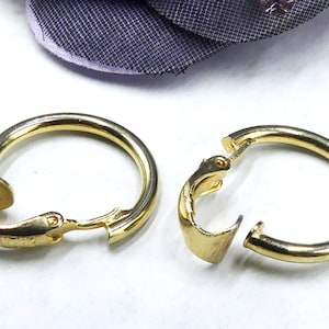Vintage marked L H Segal gold tone clip hoop earrings