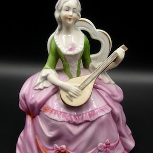 Vintage marked Germany lady play instrument porcelain figure