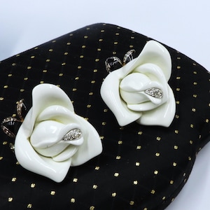 Vintage authentic signed Kenneth Lane KJL gold tone mini clear rhinestone & white/black enamel rose  clip on earrings