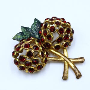 Vintage gold tone enamel & red rhinestone cherry pin brooch