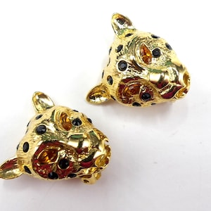 Vintage signed R.J. Graziano gold tone & black rhinestone leopard clip earrings