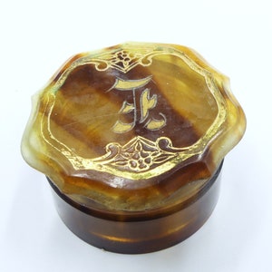 Vintage small celluloid with glass insert and lid
