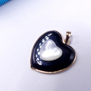 Vintage marked 14k gold and black onyx mother of pearl heart shape pendant