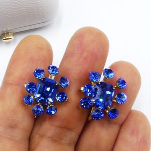 Vintage signed Coro gold tone & blue rhinestone screw back earrings