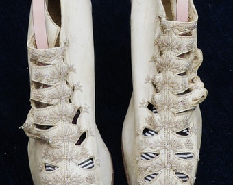 Antique 19th C Victorian leather high heel shoes w beading cutouts color ivory by Gimbel Brother New York & pair shoe stretchers