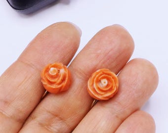 Vintage pair marked 40's 14k gold & carved natural coral rose screw back earrings