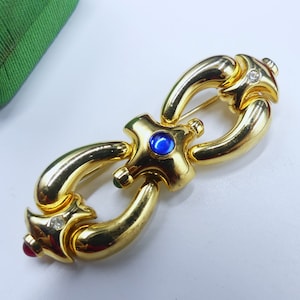 Vintage well made gold tone & clear rhinestone blue/green  glass cabochon bow pin brooch