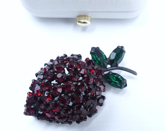 Vintage signed Warner strawberry black tone & red green rhinestone pin brooch