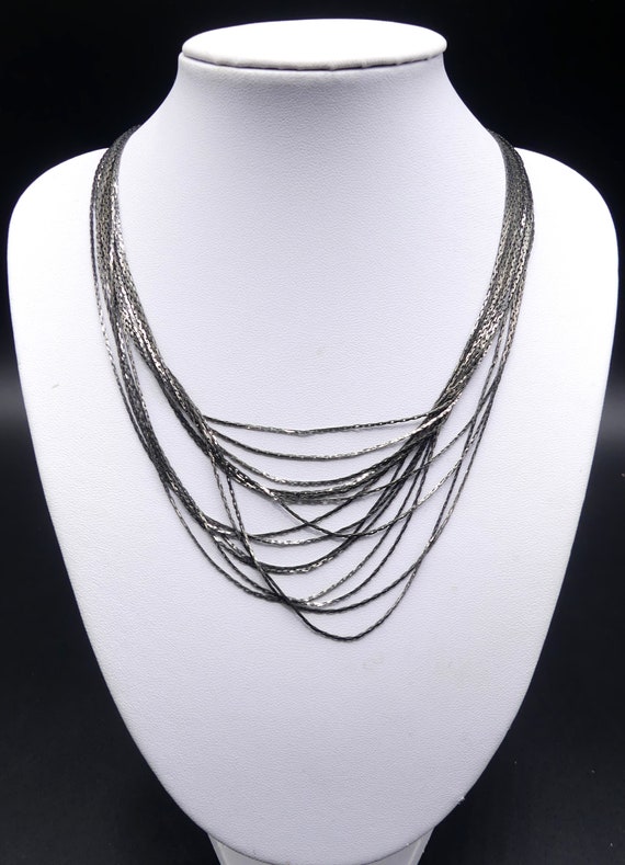 Vintage signed Express 15 multi string dark metal… - image 7