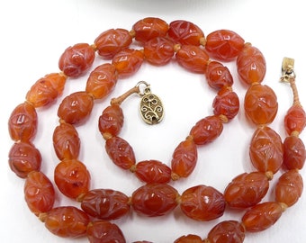 Antique silver clasp & hand carved carnelian beads necklace