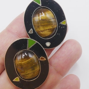 Vintage signed Victor Carranza silver tone enamel tiger eye cabochon oval clip earrings