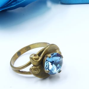 Antique brass & light blue rhinestone ring size 6.5