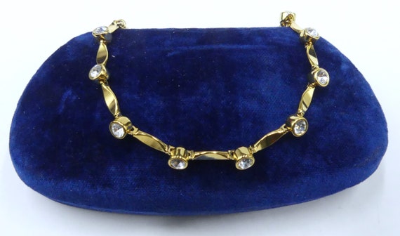 Vintage signed Joan River gold tone metal & clear rhinestone link bracelet