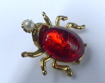 Vintage gold tone& red glass cabochon faux pearl bug stick pin